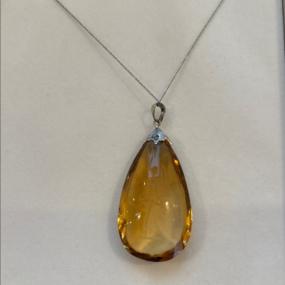 Elegant Amber Pendant Necklace with carving. Vintage